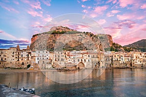Landscape with beach and medieval Cefalu town