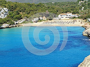 Landscape of the beautiful bay of Cala Estany d`en Mas with a wonderful turquoise sea, Cala Romantica, Porto Cristo, Majorca photo