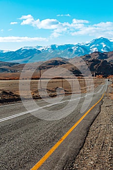 Landscape with beautiful empty mountain road. Travel background. Highway at mountains.