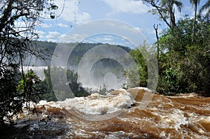 Landscape of big beautiful waterfalls, Cataratas do Iguacu (Iguazu Falls), located in Argentina and Brazil (flood