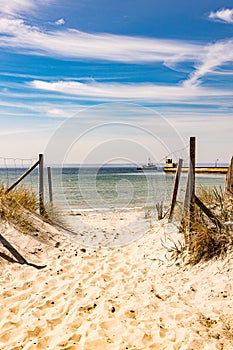 Landscape of the blue Baltic sea in Poland and the beach on a sunny warm day