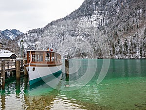 Landscape blue green lake moutain Passenger boat on the Koenigssee, Bavaria, Germany