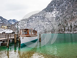 Landscape blue green lake moutain Passenger boat on the Koenigssee, Bavaria, Germany