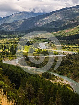 Landscape of Blue river, valley and forest in El Bolson, argentinian Patagonia