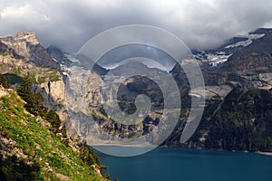 Landscape with Bluemlisalp mountain between Oeschinen mountain station and Oeschinensee lake.