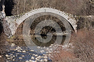 Landscape of Bridge of Kontodimos or Lazaridis in Vikos gorge and Pindus Mountains, Zagori, Epirus, Greece