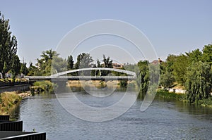 Landscape with Bridge over Crisul Repede River of Oradea City in Romania.