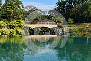 Landscape with a bridge and a swimming pool. expensive luxury hotel in the tropics. rest in a hotel in the summer by sea.