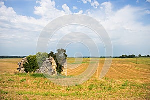 Landscape with broken house photo