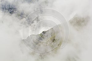 Landscape from Bucegi Mountains, part of Southern Carpathians in Romania in a foggy day