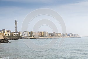 Landscape of Cadiz waterfront and town from the beach. Spain