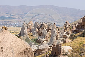 Landscape of Cappadocia mountain canyon with ancient city caves