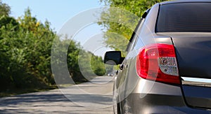 Landscape with a car on a gravel road. Travel by car, adventure in the wild