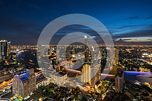 Landscape of Chao phraya river in Bangkok city in evening time with bird view. Bangkok City at night time, Hotel and resident area