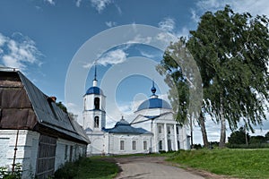 Landscape with church and birches