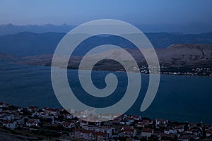 Landscape with a city of Pag in Croatia during summer evening