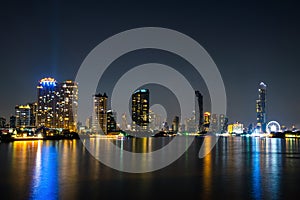 Landscape and Cityscape. Building along the Chao Phraya River at night. at Asiatique The Riverfront The landmark of Bangkok