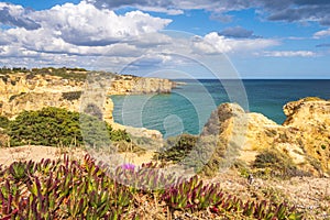 Landscape with cliffs in the coast near Albufeira, Portugal photo