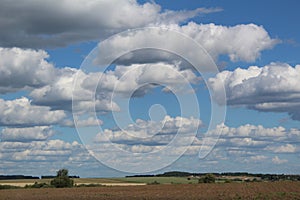 Landscape with clouds and blue sky