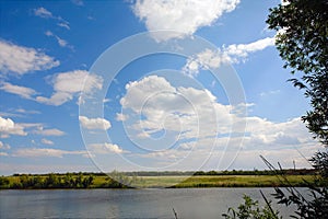 Landscape with clouds in blue sky