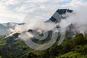 Landscape with clouds, jungles, mountains and crops Andes, Ecuador