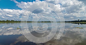 Landscape with clouds reflected, Neak Pean temple, Angkor, Cambodia