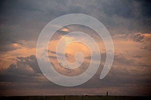 Landscape and clouds at sunset in rural area in autumn in southern Brazil.NEF