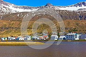 Landscape of coastal town in Northern Iceland during spring.