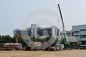 The landscape of the construction of new buildings in the industrial construction zone in Thailand is located outdoors.