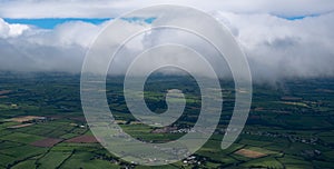 Landscape cork county from air plane window. Ireland green fields from above