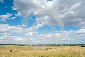 Landscape country daylight village blue sky clouds field hills