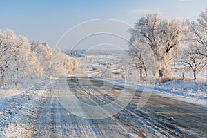 Landscape with country slippery road near Solone village  in central Ukraine