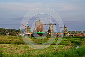 Landscape with a couple of Dutch Windmills
