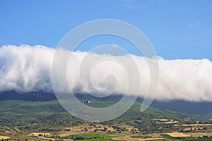 Landscape covered with white clouds photo