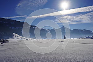 Landscape of cross country skiing region around village Studen, Switzerland in winter time.