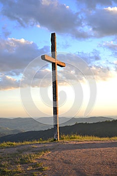 Landscape of a cross at dusk