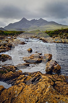 Landscape of Cuillin hills and river, Scottish highlands