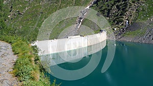 Landscape of the dam of the Lake Barbellino, an Alpine artificial lake. Italian Alps. Italy photo