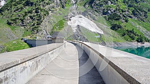 Landscape of the dam of the Lake Barbellino, an Alpine artificial lake. Italian Alps. Italy photo