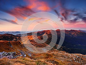 Landscape with a dawn in mountains