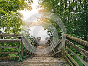 landscape day view at Canadian Ontario Kettles lake in Midland with wooden staircase to water. Canada forest nature.