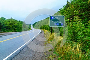 Landscape and direction sign along the Cabot Trail