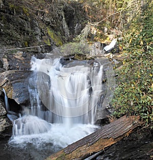 Landscape of Dukes Creek waterfalls in Georgia with green trees