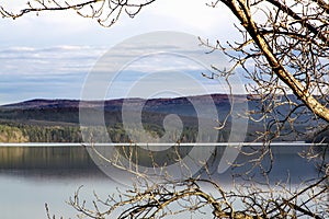 Landscape of early spring in the mountains. Lake view,