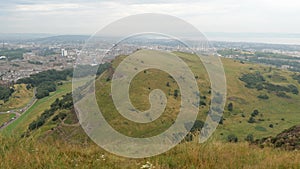 Landscape of the Edinburgh city in Scotland, Great Britain near Arthurs Seat in overcast weather