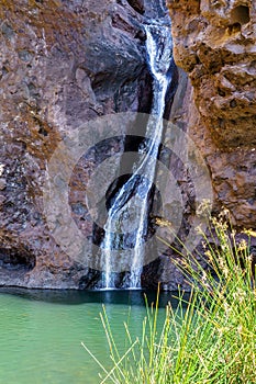 Landscape with El Charco Azul waterfall, Gran Canary photo