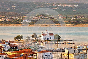 Landscape of Elafonisos island in Greece against Saint Spyridon Church.