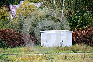 Landscape with electric transformer