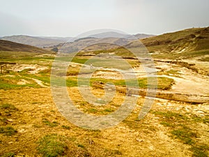 Landscape empty valley yellow hills