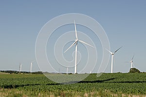 Landscape of energy efficient wind turbine at the countryside. photo
